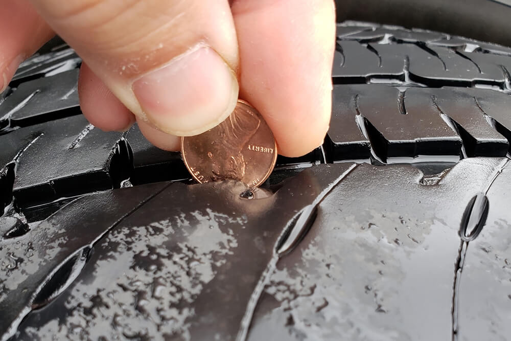 Can Honest Abe Really Tell Me if My Tire Tread Is Worn?